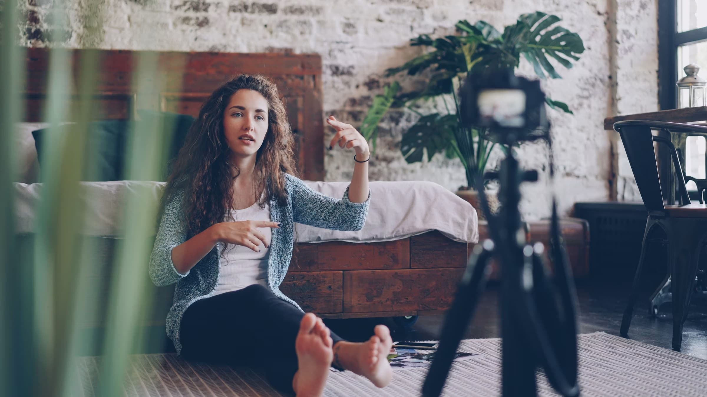 Creator filming a short-form video at home with a camera on a tripod